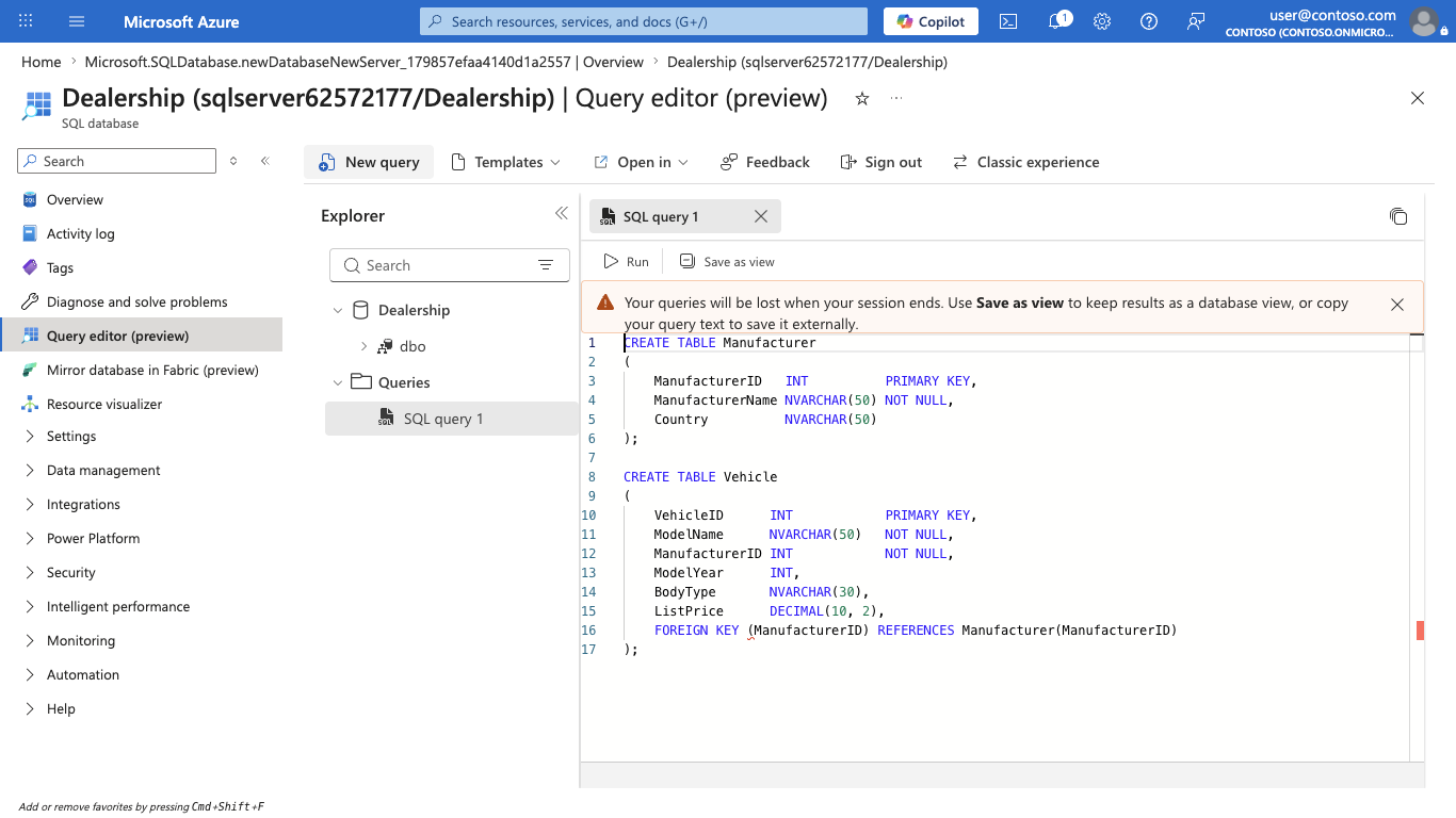 Screenshot of the query editor showing the CREATE TABLE statements for the Manufacturer and Vehicle tables.