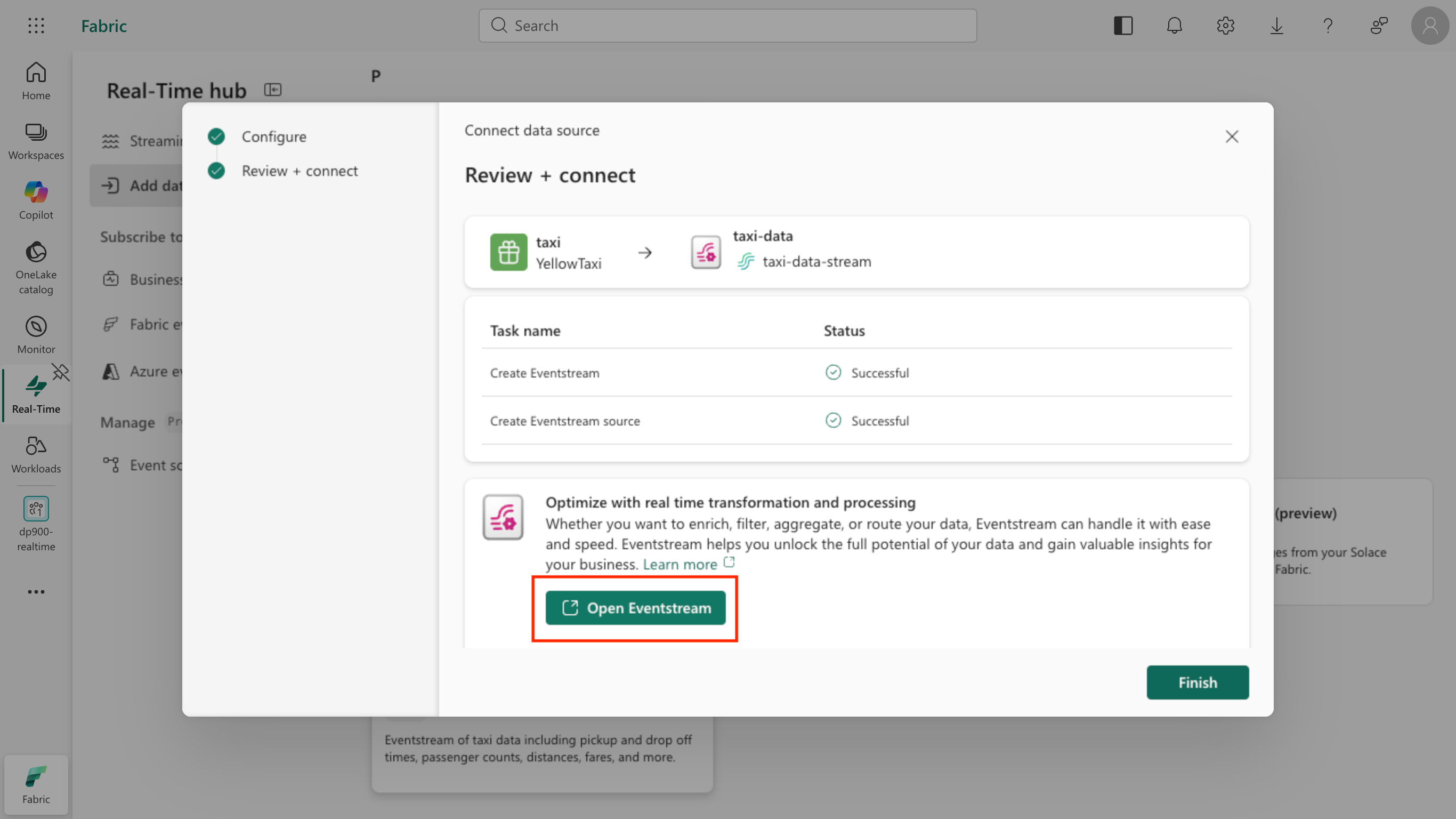 Screenshot of the completed wizard with both tasks successful and the Open Eventstream button.