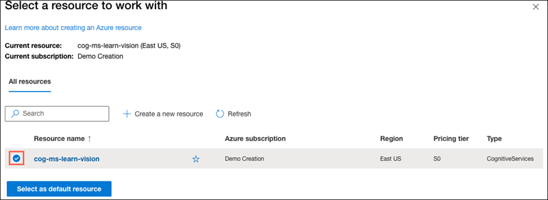 Se muestra el cuadro de diálogo Seleccionar un recurso con el que trabajar con el recurso de Cognitive Services cog-ms-learn-vision-SUFFIX resaltado y activado. El botón Seleccionar como recurso predeterminado está resaltado.