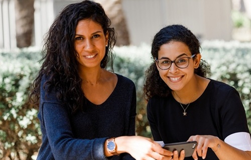 Photograph of both people.