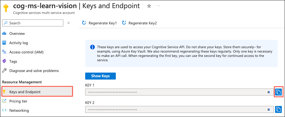 The Cognitive Services page is displayed in the Azure portal. In the left-hand navigation menu, Keys and Endpoint is highlighted and selected. The copy to clipboard button is highlighted next to the KEY 1 value.