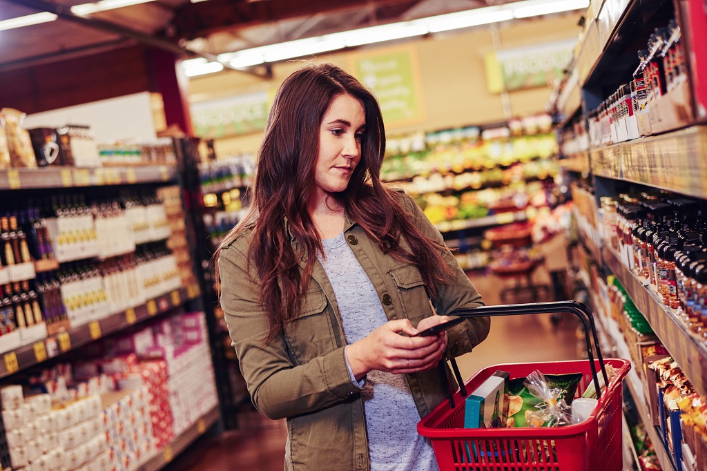 A person shopping in a grocery store.